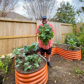 orange u shaped raised garden bed in garden-Vegega