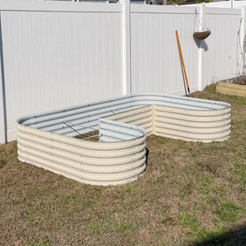 orange u shaped raised garden bed growing peppers-Vegega