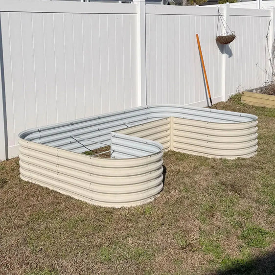orange u shaped raised garden bed growing peppers-Vegega