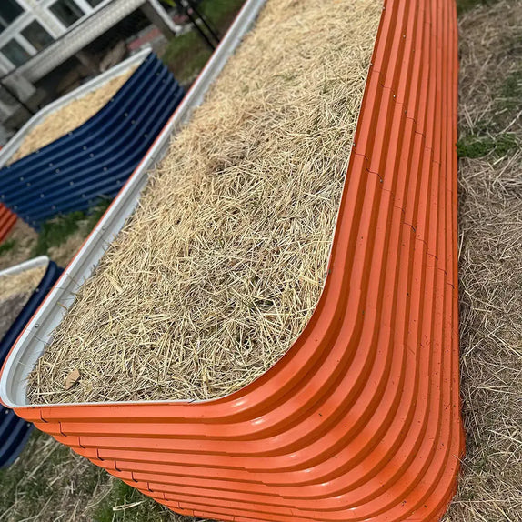 orange galvanized raised bed filling with soil-Vegega