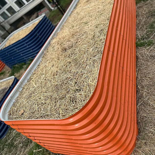 orange galvanized raised bed filling with soil-Vegega
