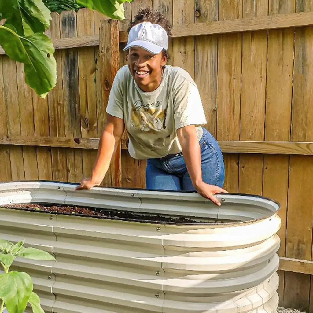 white galvanized flower bed growing veggies-Vegega