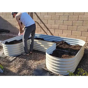 filling u shaped raised garden bed with soil-Vegega