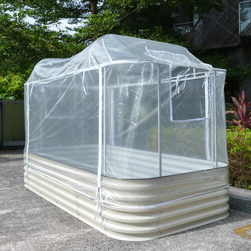 raised garden bed cover installing on a metal raised bed